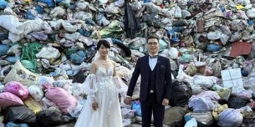 تايوانيان يوثقان زفافهما من أمام مكب نفايات